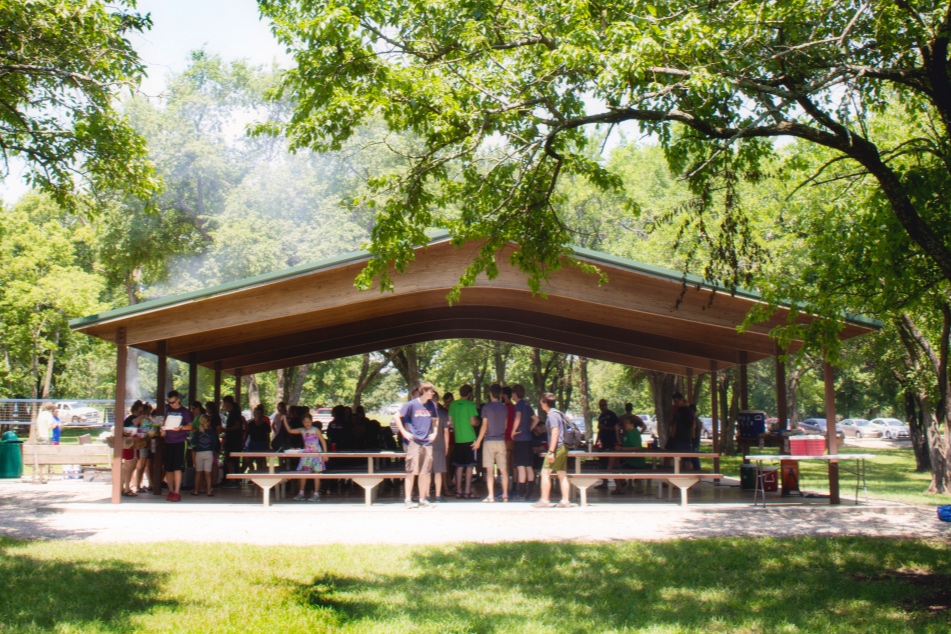 Rock Hill members eating at a park